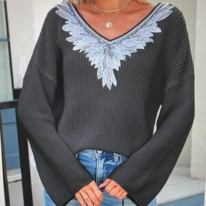 Elegant Black Sweater with Embroidered Detail